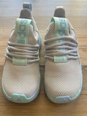 Kids Lite Racer Adapt shoes in a light blue and grey